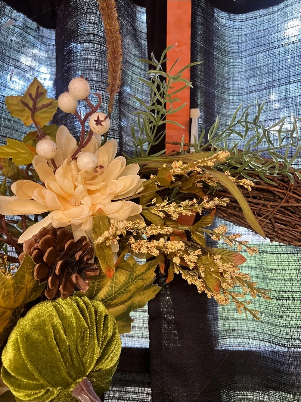 Handcrafted Cream Floral Grapevine Wreath with Green Accents